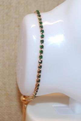 Thin Infinity Line of Small Round Green Stones Bracelet (7") with a Bolo Clasp
