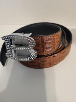 BARABAS LEATHER BELT, BREYER HORSE AND A GUITAR STRAP