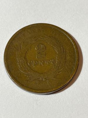1864 GOOD CONDITION TWO CENT PIECE TYPE COIN AS PICTURED.