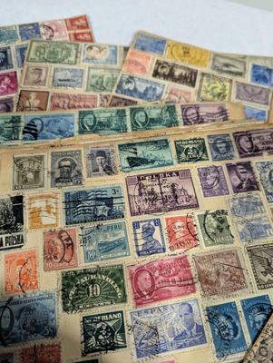 Vintage Stamps Attached To Craft Paper Stamps On Both Sides