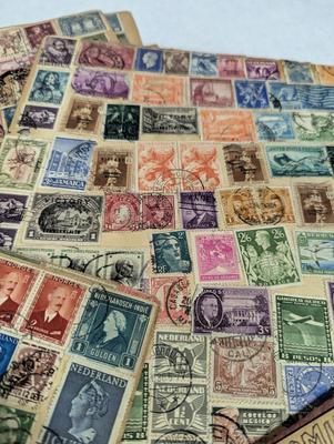 Vintage Stamps Attached To Craft Paper Stamps On Both Sides
