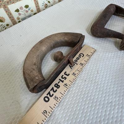 Antique sad irons & pieces