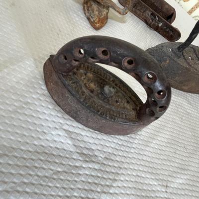 Antique sad irons & pieces