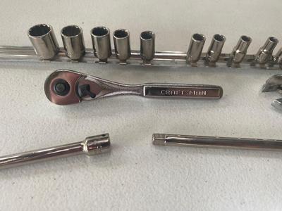 Nice Little 1/4” Drive Socket Set with Ratchet Extensions and adjustable wrench I don’t know what