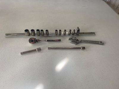 Nice Little 1/4” Drive Socket Set with Ratchet Extensions and adjustable wrench I don’t know what