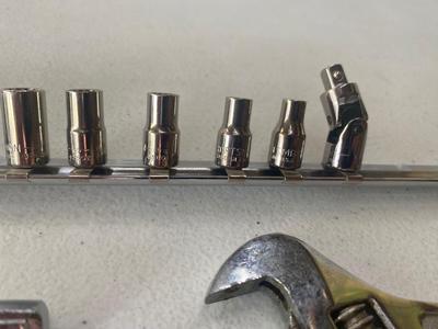 Nice Little 1/4” Drive Socket Set with Ratchet Extensions and adjustable wrench I don’t know what