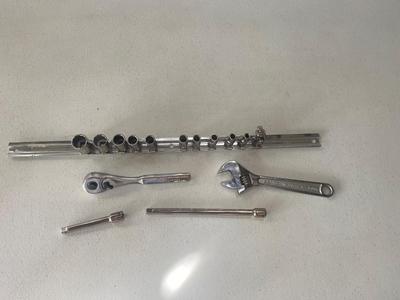 Nice Little 1/4” Drive Socket Set with Ratchet Extensions and adjustable wrench I don’t know what