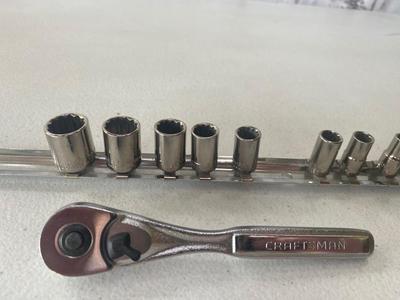 Nice Little 1/4” Drive Socket Set with Ratchet Extensions and adjustable wrench I don’t know what