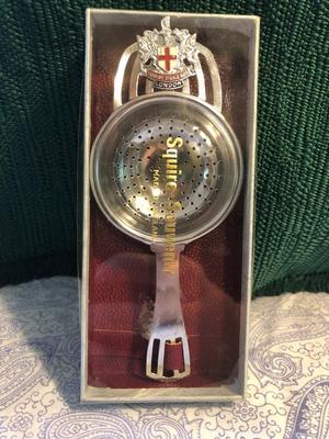 Vintage White Victorian Style. Teapot and Souvenir Tea Strainer