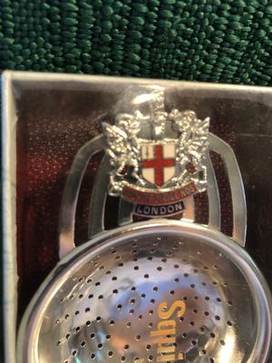 Vintage White Victorian Style. Teapot and Souvenir Tea Strainer