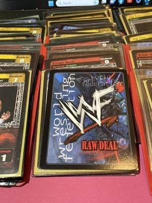 Lot of 135 Holdered WWF Wrestling Cards Preowned from an Estate.