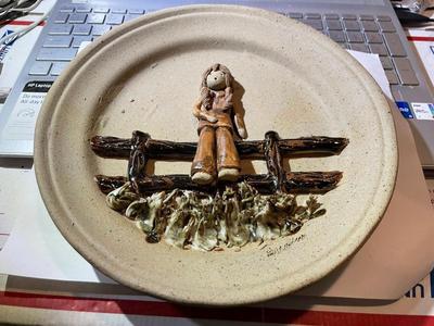 Vintage 9" Pottery Plate Signed Girl on Wooden Fence as Pictured.
