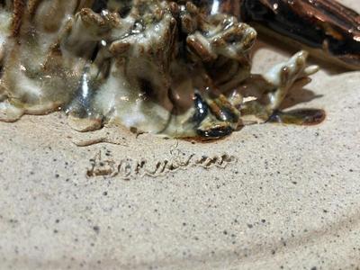Vintage 9" Pottery Plate Signed Girl on Wooden Fence as Pictured.