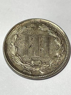 1865 AU CONDITION 3-CENT NICKEL TYPE COIN WITH LAMINATION PEEL ERROR AS PICTURED.