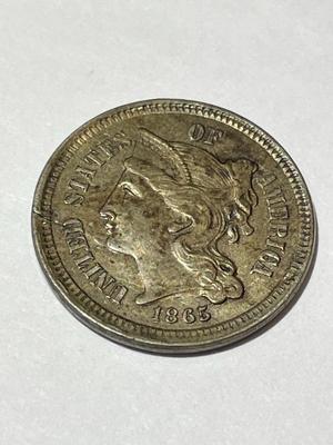 1865 AU CONDITION 3-CENT NICKEL TYPE COIN WITH LAMINATION PEEL ERROR AS PICTURED.