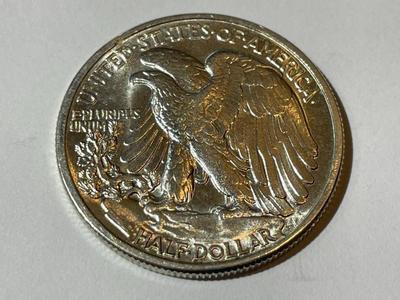 1943-P BRILLIANT UNCIRCULATED (UNCERTIFIED) WALKING LIBERTY SILVER HALF DOLLAR.