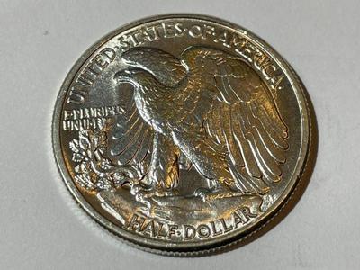 1944-P BRILLIANT UNCIRCULATED (UNCERTIFIED) WALKING LIBERTY SILVER HALF DOLLAR.