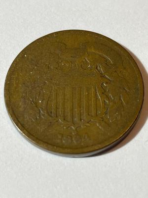 1864 GOOD CONDITION TWO CENT PIECE TYPE COIN AS PICTURED.