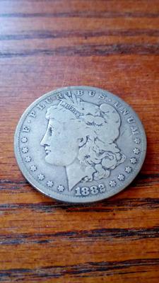 LOT 75 1882 SILVER DOLLAR