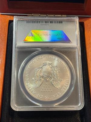 ANACS CERTIFIED 2012 MS70 FIRST DAY OF ISSUE AMERICAN SILVER EAGLE IN A CUSTOM WOODEN BOX.