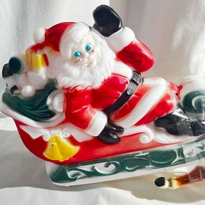 Vintage 1970 Santa's Sleigh and 2 Reindeer Lighted Blow Mold Table Top it needs light Bulb