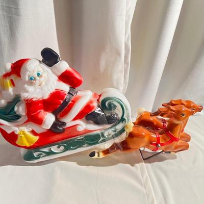 Vintage 1970 Santa's Sleigh and 2 Reindeer Lighted Blow Mold Table Top it needs light Bulb