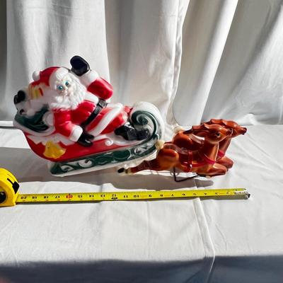Vintage 1970 Santa's Sleigh and 2 Reindeer Lighted Blow Mold Table Top it needs light Bulb