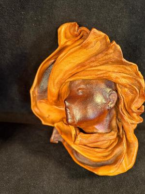 Lot 5. Pair of Leather Wall Sculptures