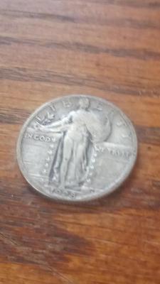 LOT 129 1928 SILVER QUARTER