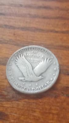 LOT 129 1928 SILVER QUARTER