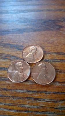 LOT 136 THREE EARLY UNC LINCOLN MEMORIAL CENTS