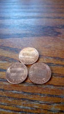 LOT 136 THREE EARLY UNC LINCOLN MEMORIAL CENTS