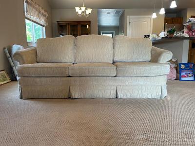 IVORY COLORED SOFA WITH SLIPCOVER CUSHIONS