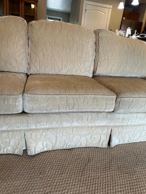 IVORY COLORED SOFA WITH SLIPCOVER CUSHIONS