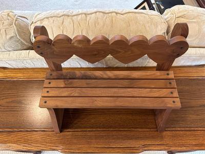 2 PLUSH TEDDY BEARS ON A WOODEN BENCH