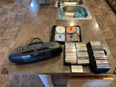 MAGNAVOX BOOMBOX, CASSETTES AND CD'S