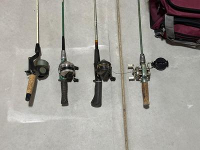 FISHING POLES WITH REELS AND A NYLON BAG