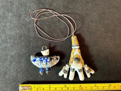Lot 158. Two Ceramic Pendants