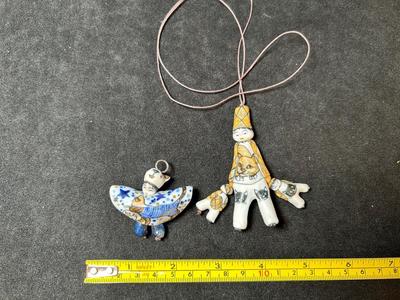 Lot 158. Two Ceramic Pendants