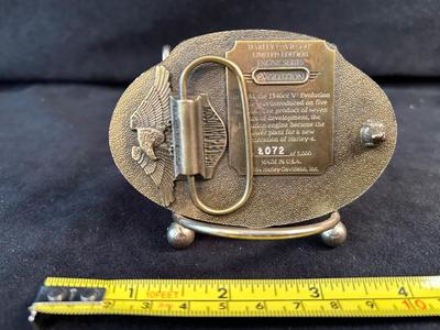 Lot 39. Belt Buckle - Evolution