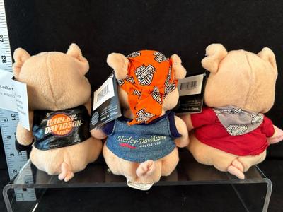 Lot 72. Three Plush Pigs