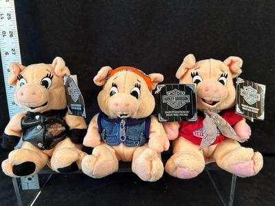 Lot 72. Three Plush Pigs