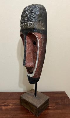 Wooden Face Statue