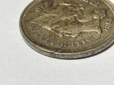 1865 AU CONDITION 3-CENT NICKEL TYPE COIN WITH LAMINATION PEEL ERROR AS PICTURED.