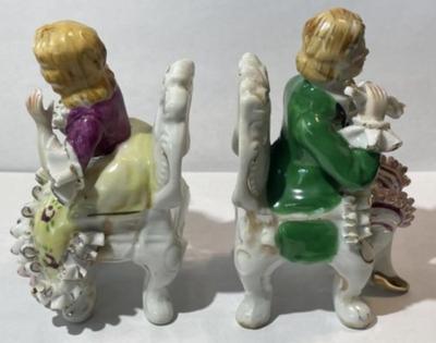 Pair of Vintage Bone China Lace Young Woman & Man on Chair Figurines 4" Tall in VG Preowned Condition.