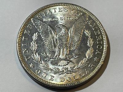 1881-O MS63/64 CONDITION MORGAN SILVER DOLLAR LIGHTLY TONED RIM.