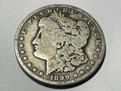 1899-S VERY GOOD CONDITION MORGAN SILVER DOLLAR AS PICTURED.
