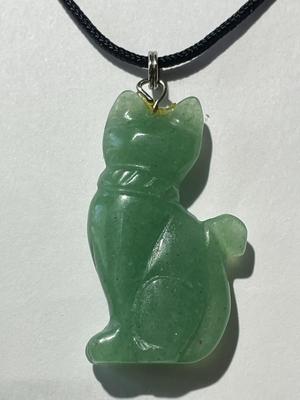 VINTAGE ASIAN JADE/JADEITE CAT CARVED PENDANT 1.5" TALL ON A BLACK CLOTH ROPE AS PICTURED.