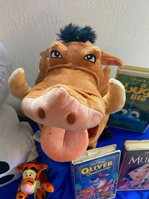 DISNEY MOVIES AND PLUSH ANIMALS FOR THE KID IN ALL OF US!