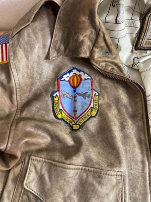 VINTAGE BOMBER JACKET AND AVIATOR HAT